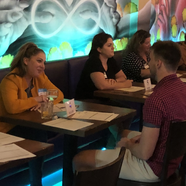 Attendees at a WI speed dating event